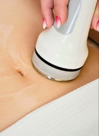 A relaxed woman on a Cryo Body Sculpting Service Image